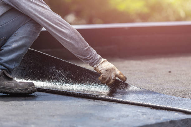 Professional Basement Waterproofing technician working in Red Bank, SC
